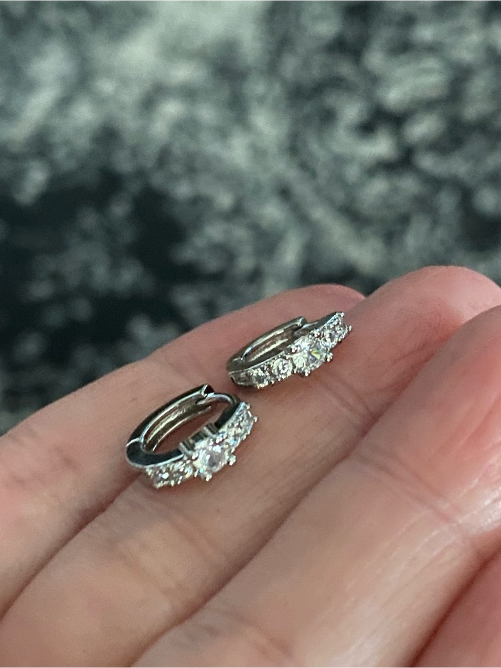 Diamond-Cut Silver Huggie Earrings in Silver